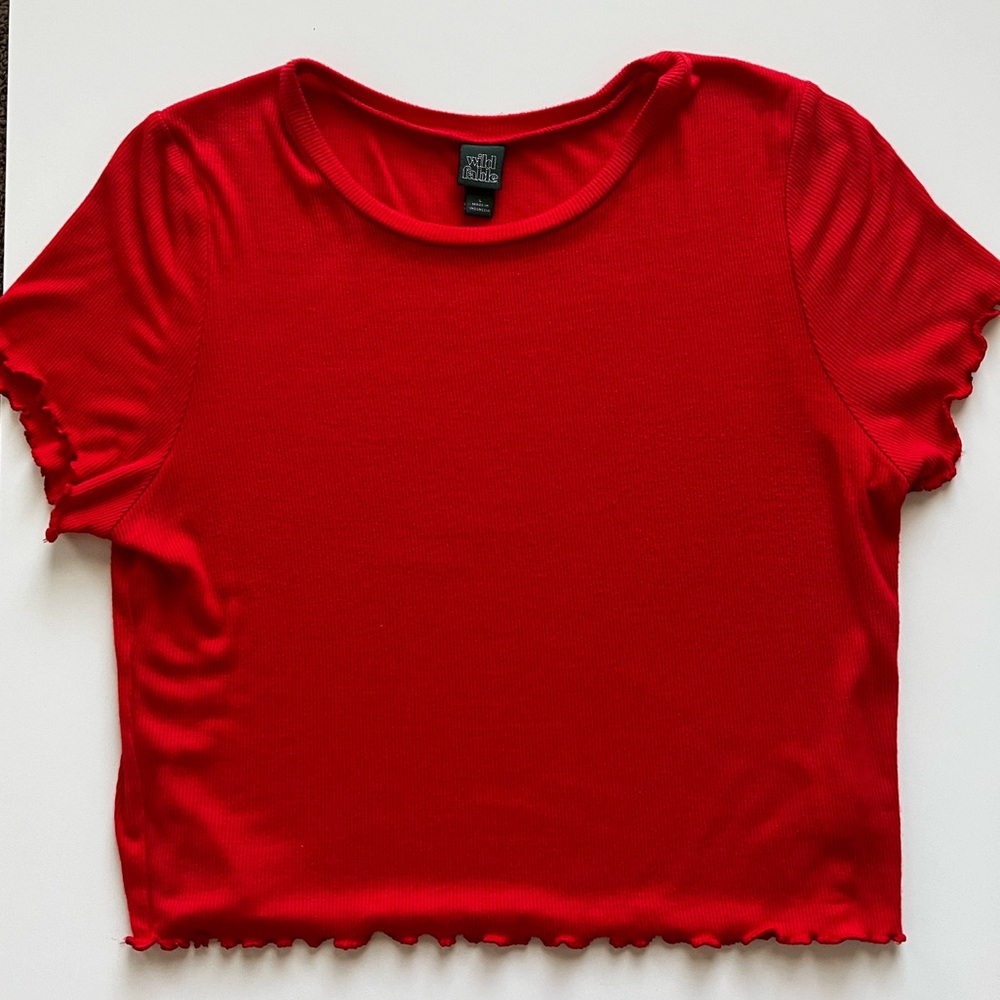 Red ribbed baby tee with ruffled edges